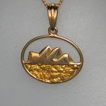 Gold nugget `Opera House` pendant