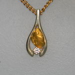 Nugget and diamond wishbone white gold pendant